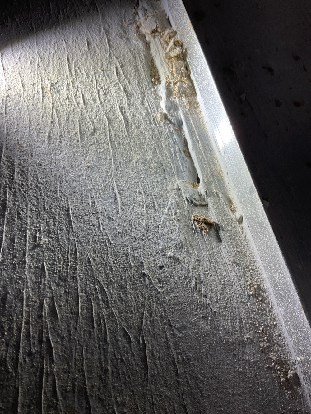Unfilled holes in the shower base above a ground floor ceiling, recorded during a fixing inspection in Fraser Rise, 4 km from Rockbank